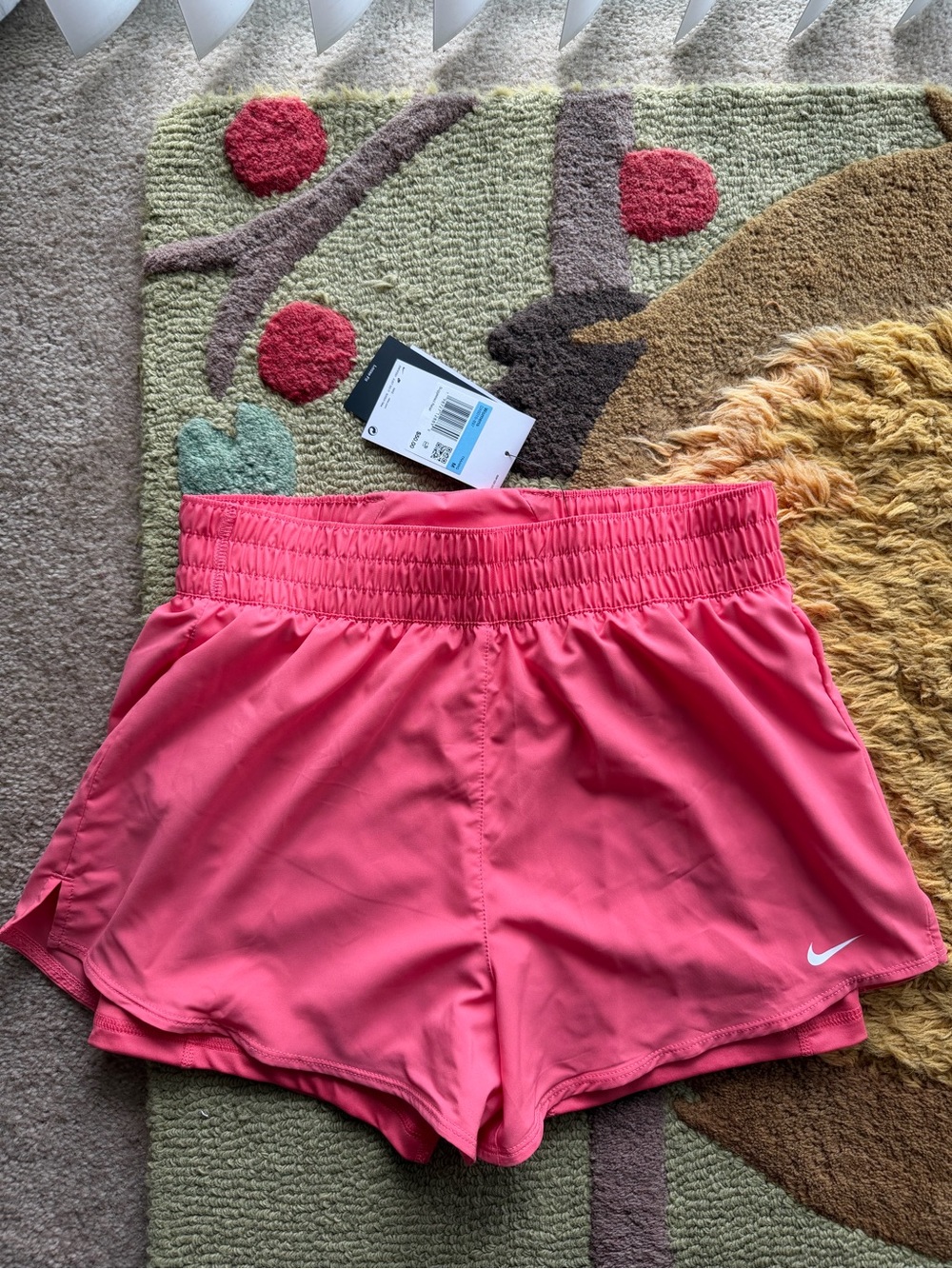 Nike Women’s Coral Pink Athletic Shorts with Smocked Waistband